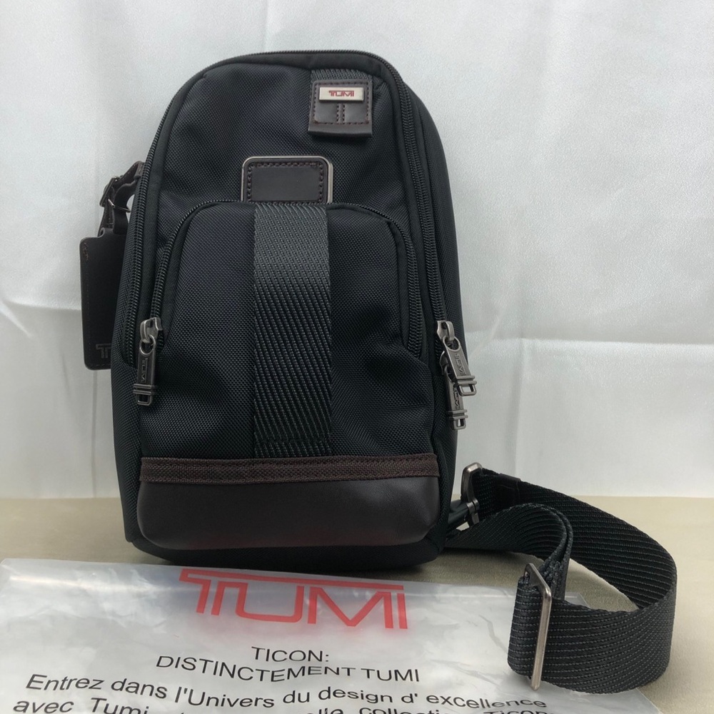 TU.MI SLING BAG In black